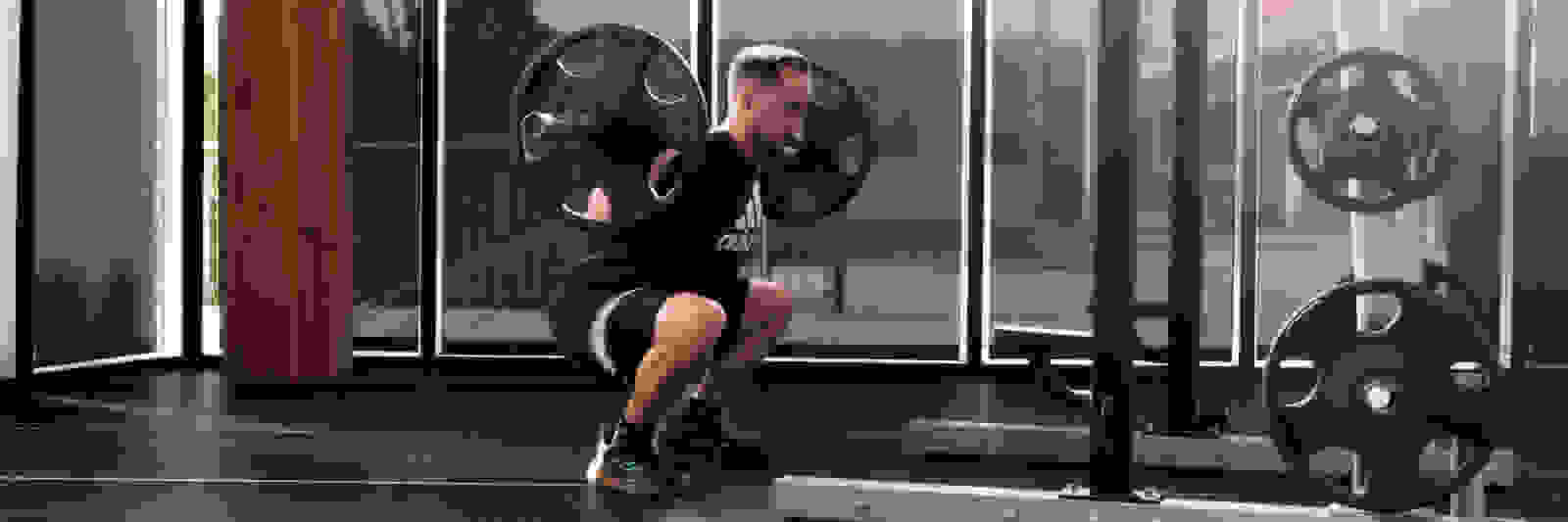 How To Squat A Bar