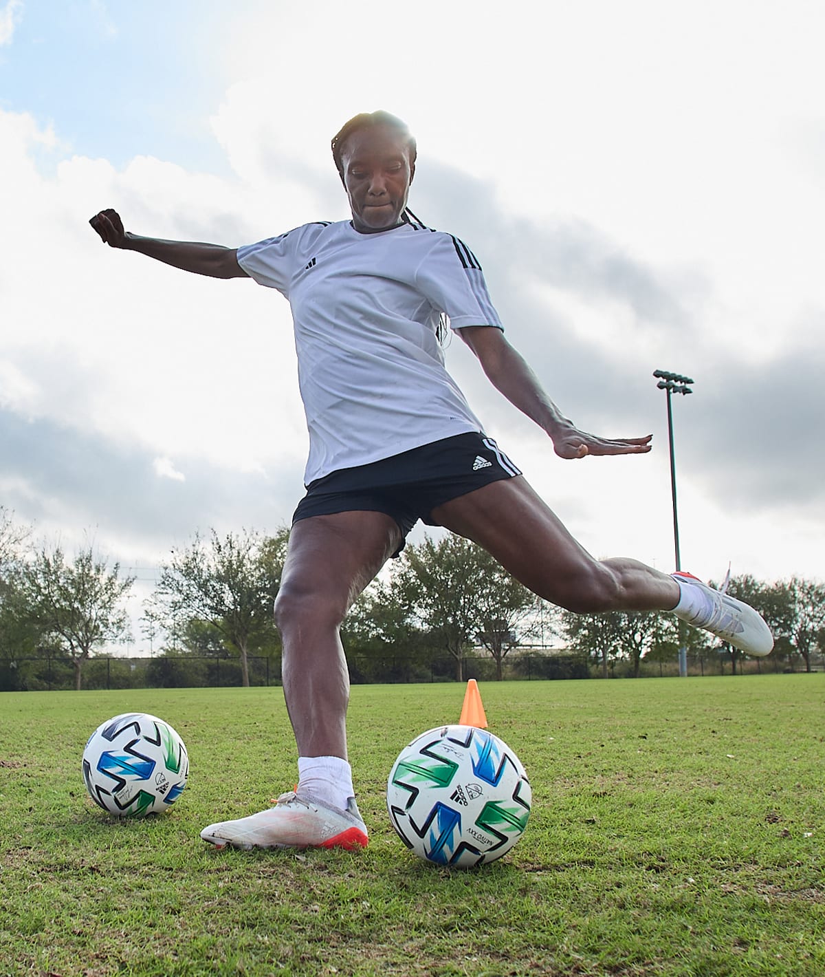 During the game, a soccer player kicked the ball