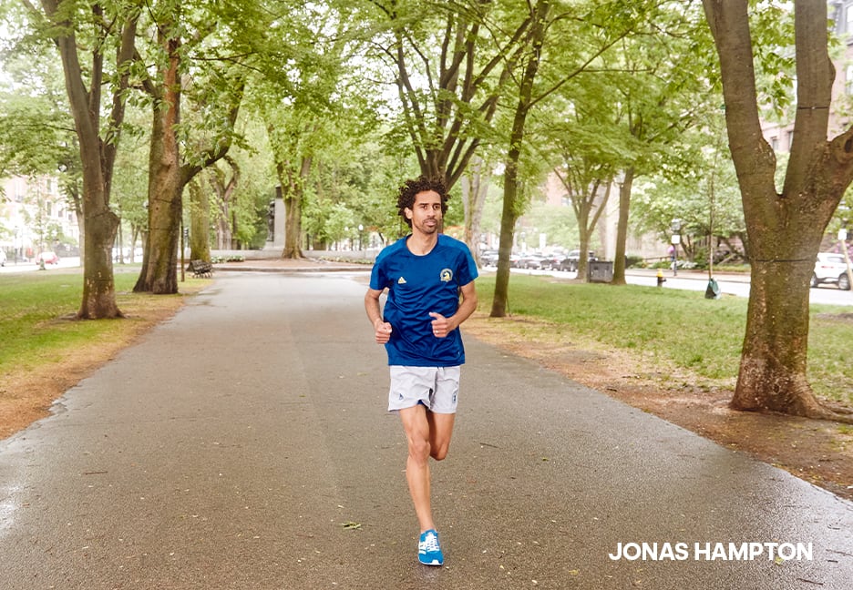 Gray day, city marathon, a lot of running people in sports clothes