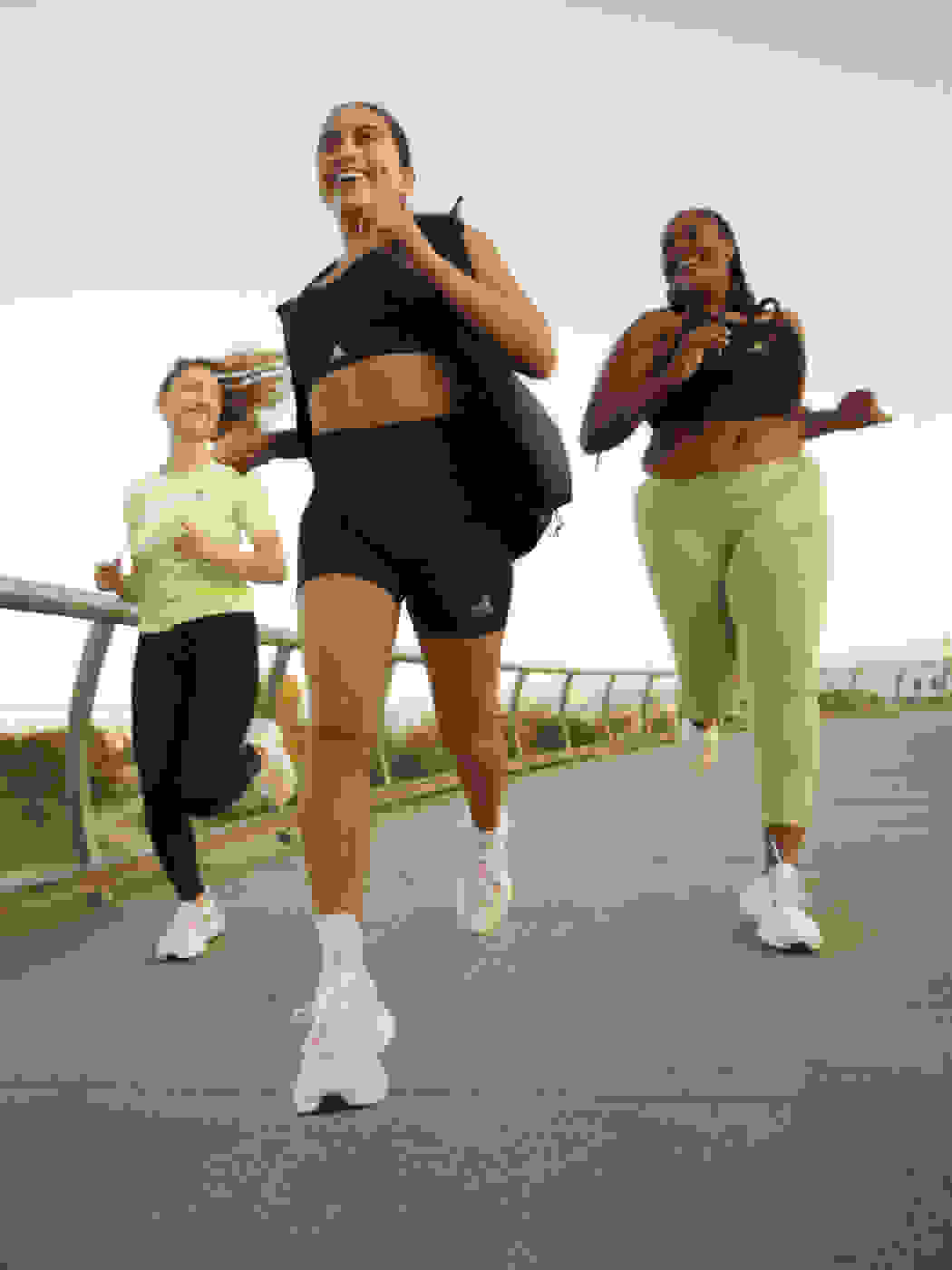 Image of a group of women running in the Solarglide 5 shoe