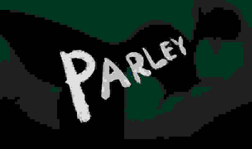 Parley logo with whale in the background