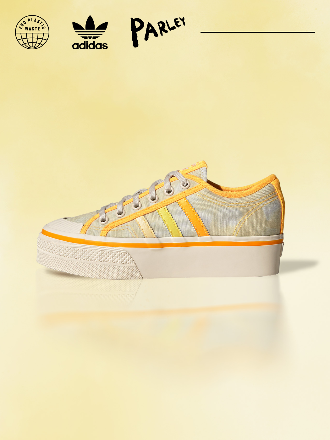 The Nizza sneaker in sun bleached yellow with orange 3-stripes is pictured from the side on a yellow background.