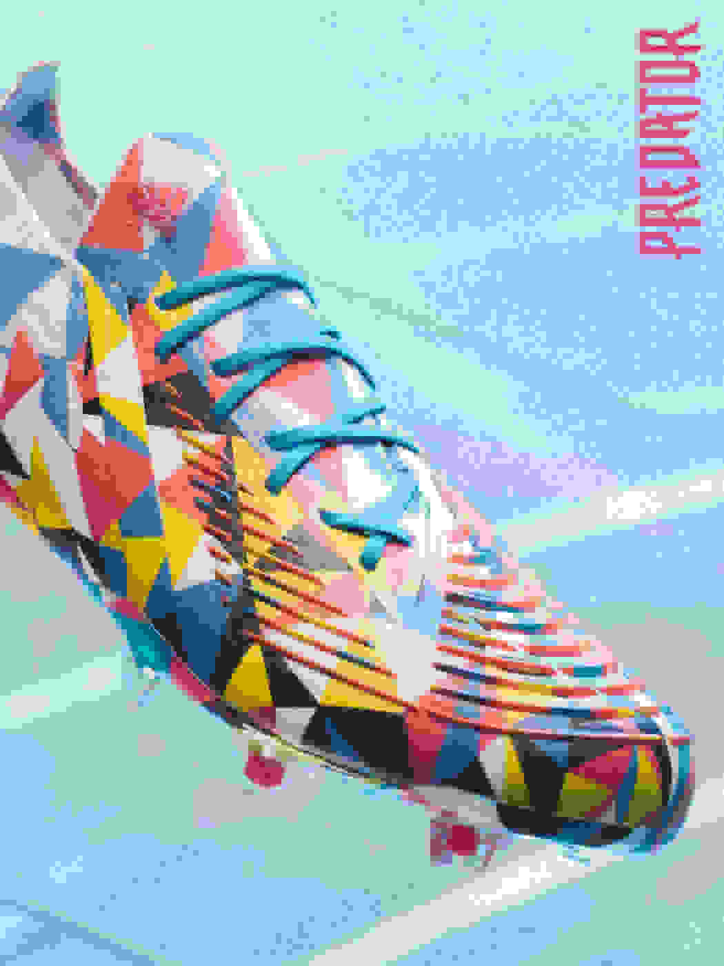 A visual of the laced Predator football boot on a textured background.