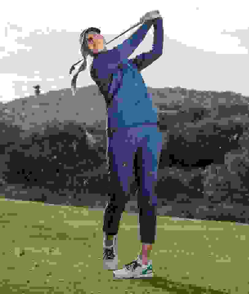 close-up of woman playing golf