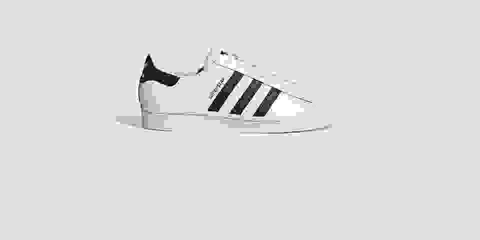 white and black adidas shoes