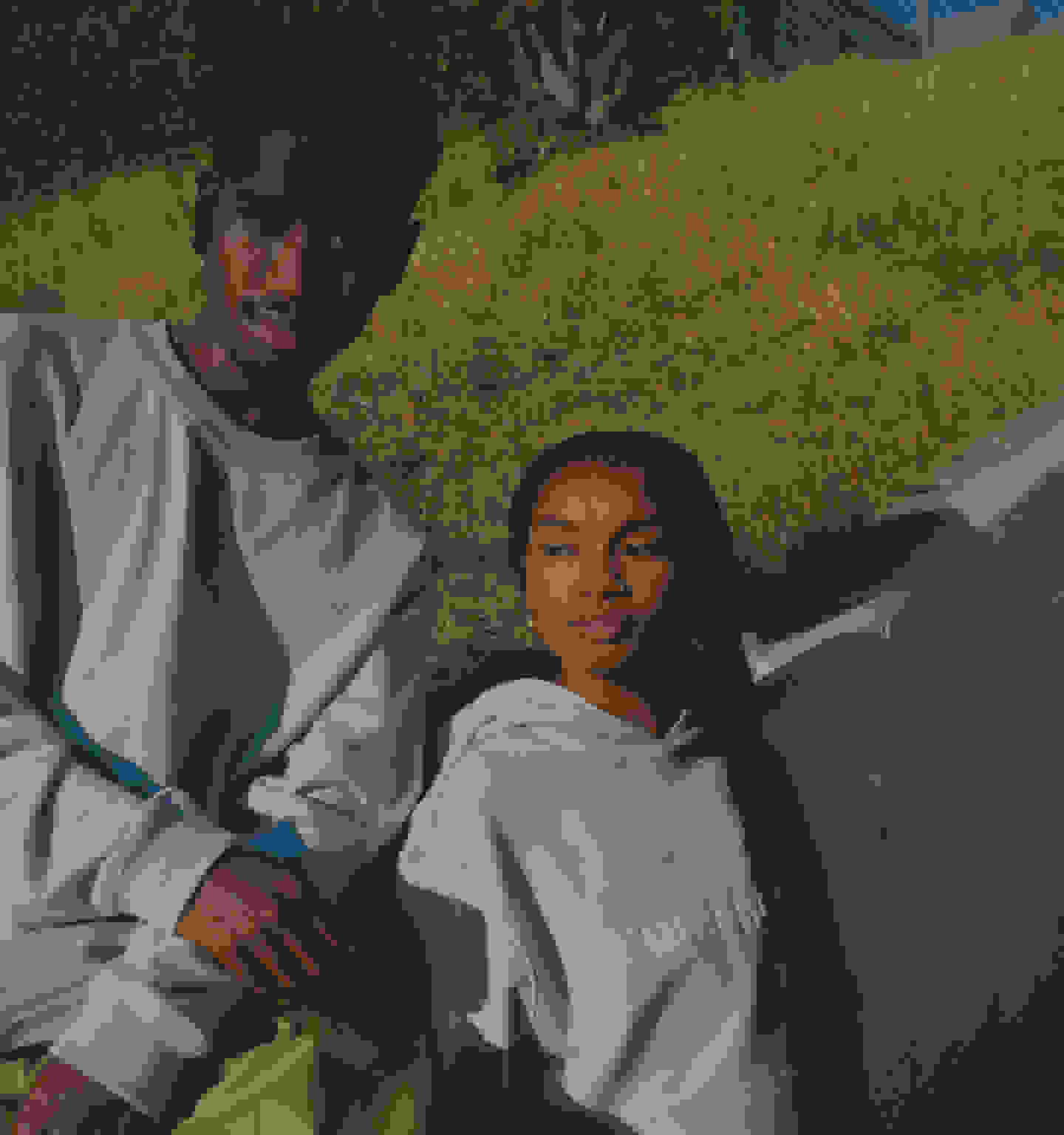 MALE AND FEMALE MODEL POSING FOR PW RYAT BLACK