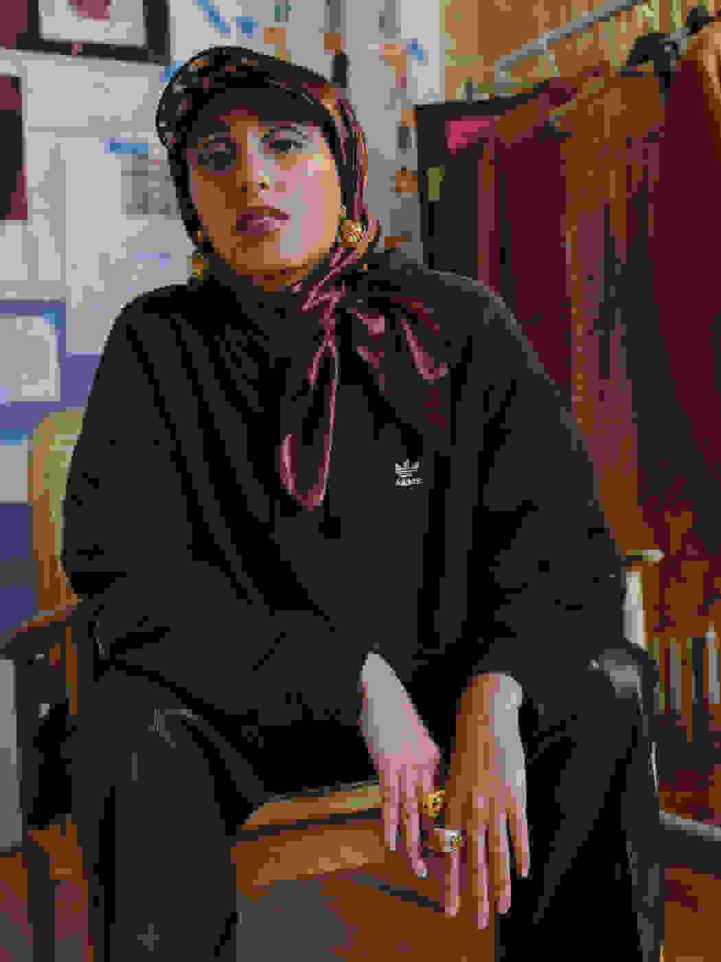 Entrepreneur, Taqwa Bint-Ali, wearing the adidas Always Original black hoodie and track pant