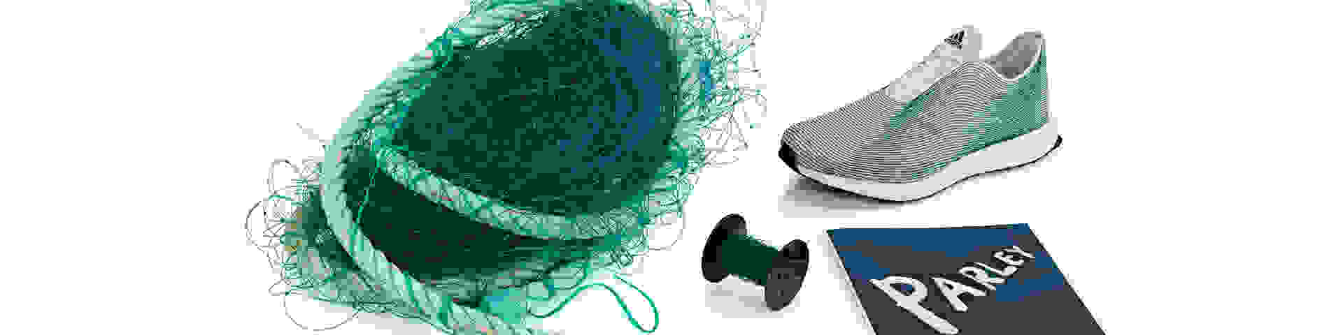An image of adidas' Parley shoe next to a fishing net and rope.