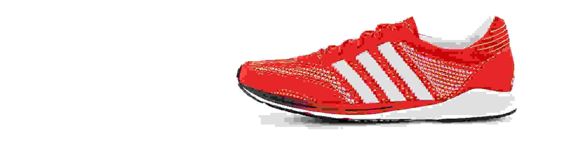 A red adidas olympics running shoe