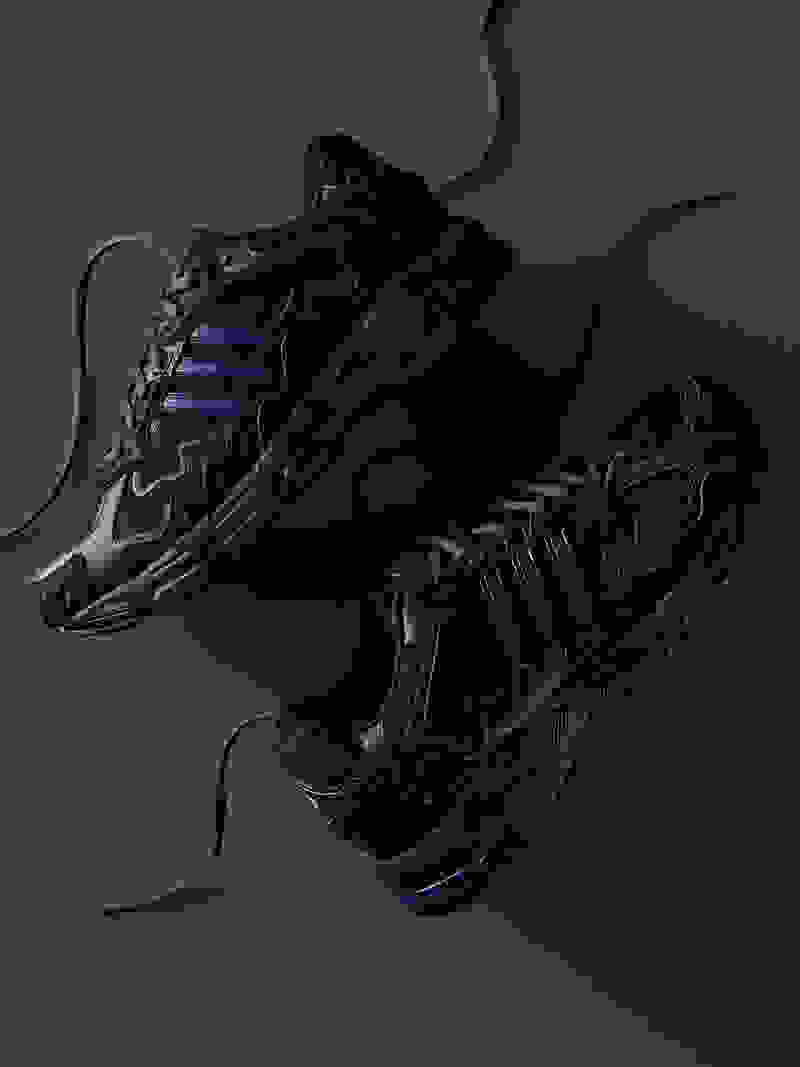 A pair of Bad Bunny Response CL black sneakers are displayed on a black background.