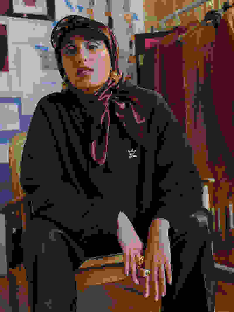Entrepreneur, Taqwa Bint-Ali, wearing the adidas Always Original black hoodie and track pant