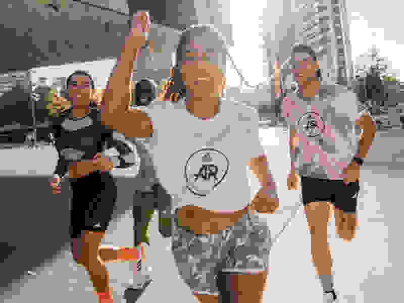 Group of Adidas Runners run together as a community.