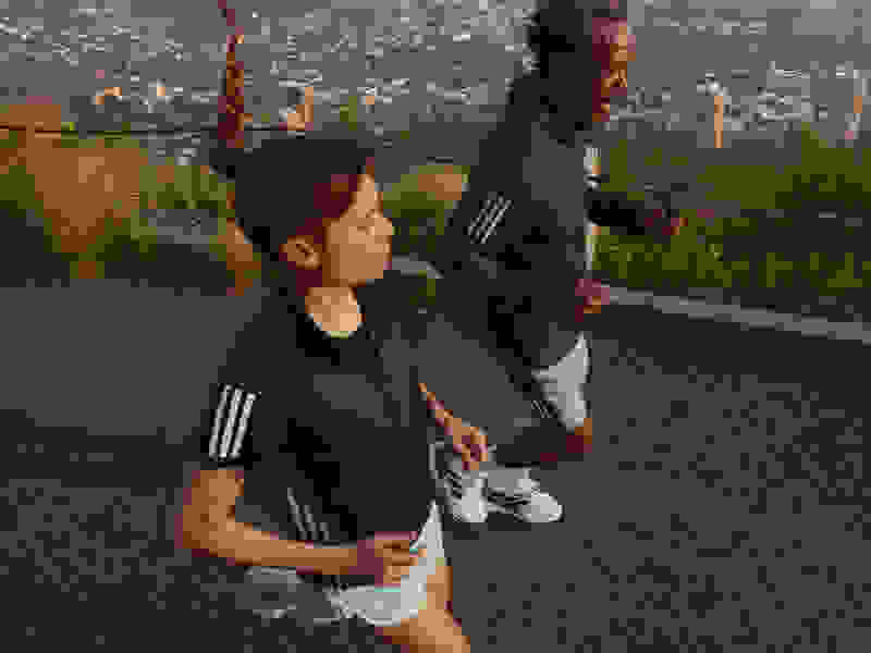 Runner completes their long run, wearing Adistar shoes.