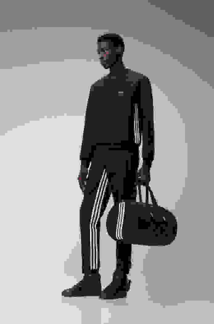 Model wearing the new adidas for Prada re-nylon collection