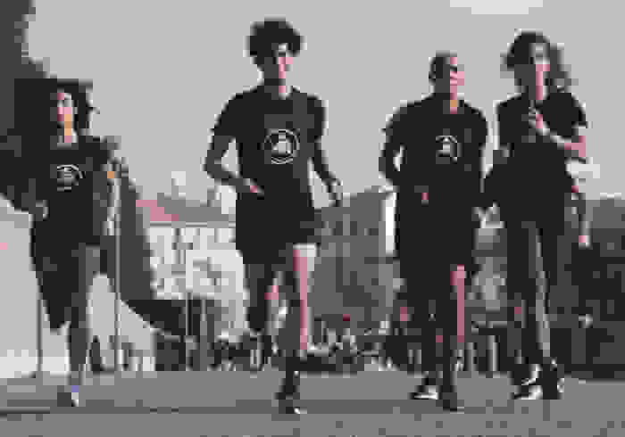adidas runners Milano captain Paolo Bellomo leads a city run in the sinshine.