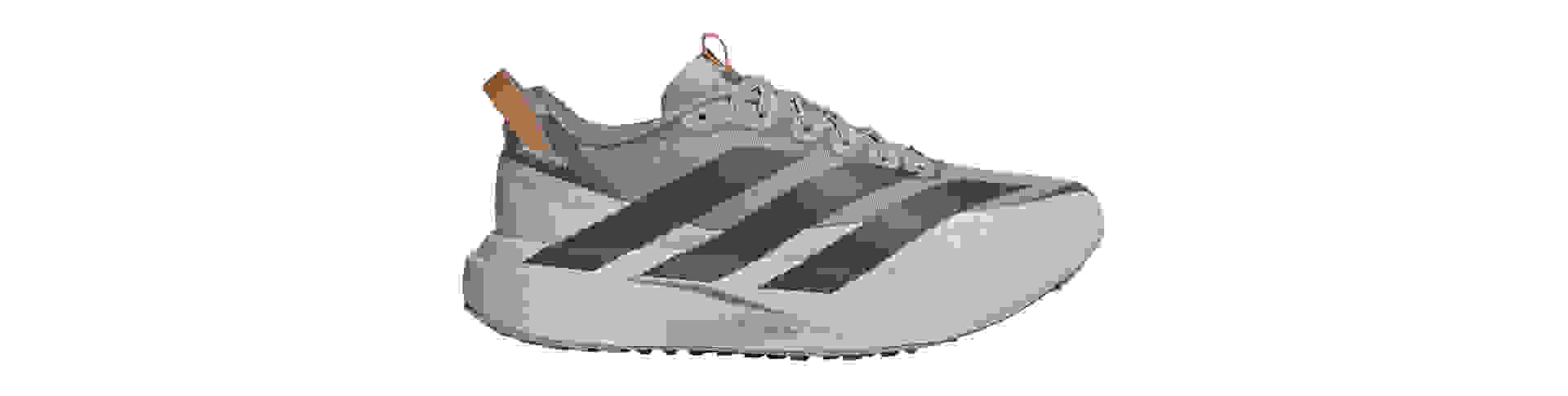 A pair of gray and white athletic shoes with thick soles and a platform design, set against a plain white background.