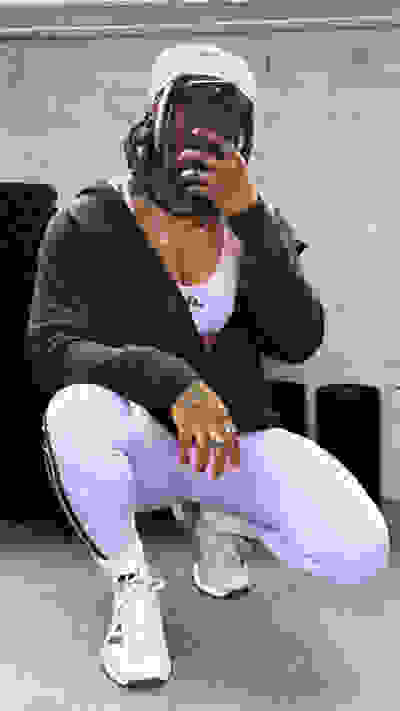 Image of model wearing the Optimé Collection in a gym environment. Hover over of another image with the same model doing a strength exercise.