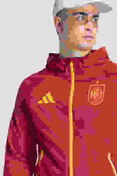 Image of a man wearing a track top