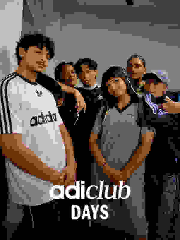 A group of young people, some wearing Adidas clothing, posing together in what appears to be an indoor setting.
