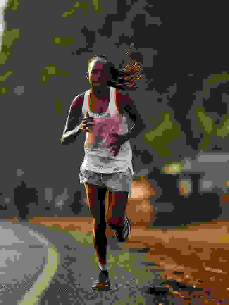 Olympian Peres Jepchirchir running, wearing adidas.