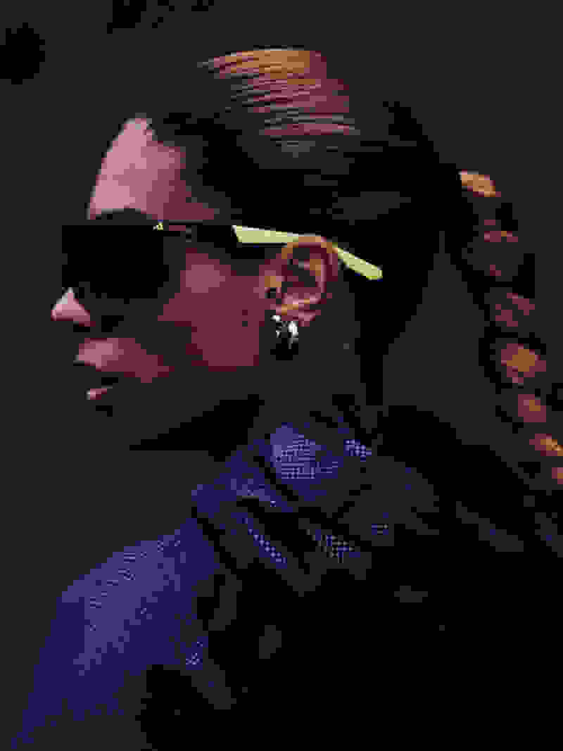 close up on female runner in sunglasses