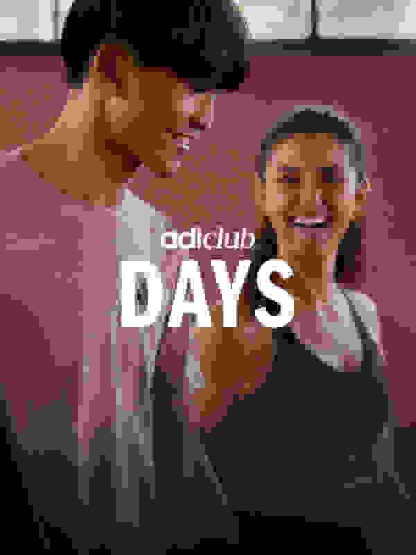 Two people smiling after a workout. 