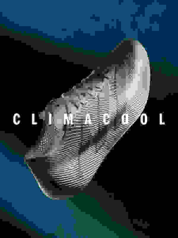 A sleek, futuristic-looking sneaker with a textured, patterned upper against a dark, moody background.