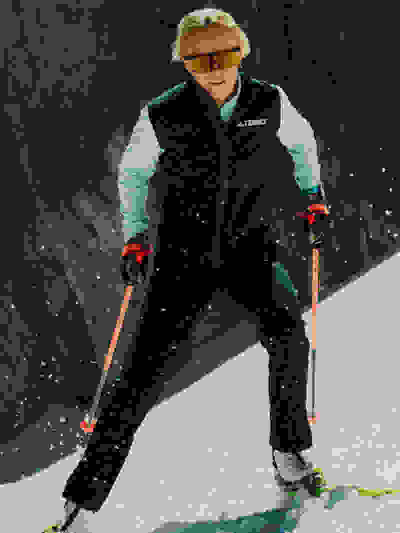 An image of Frida Karlsson skiing on snow in adidas TERREX gear.