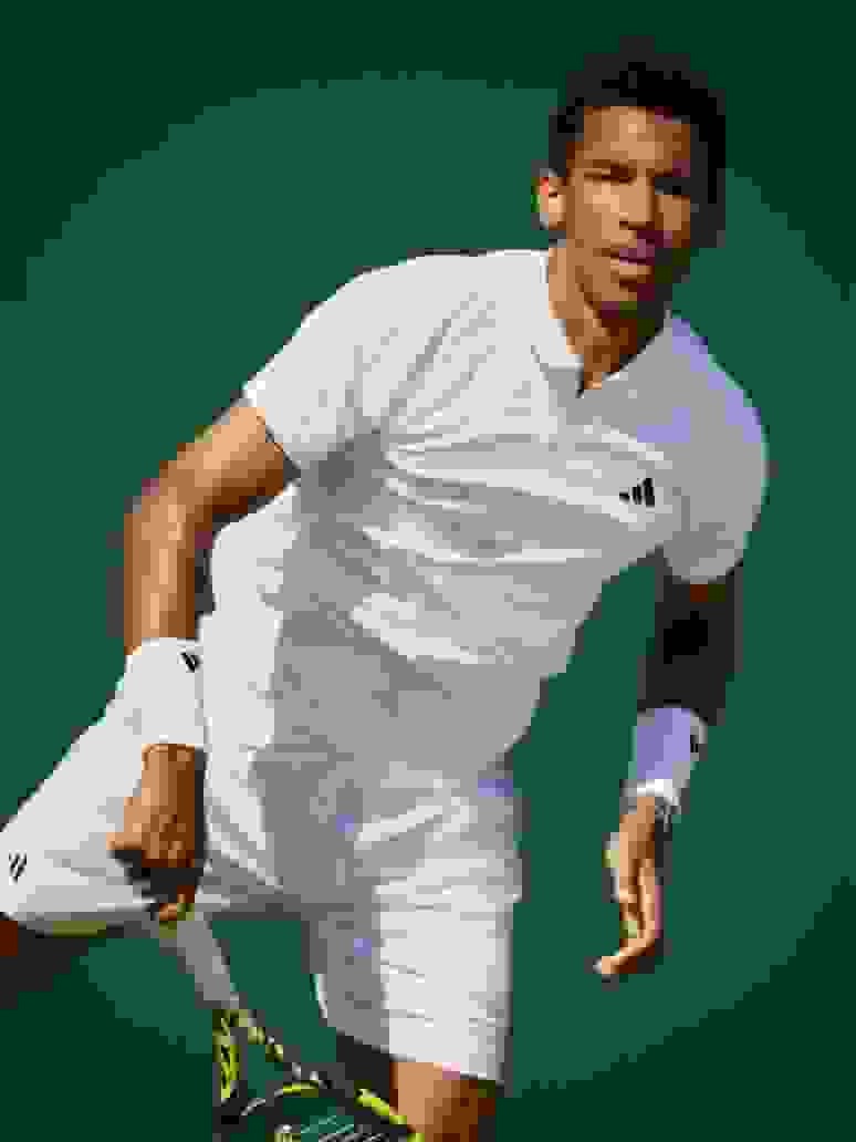 Felix Auger Aliassime playing tennis in the adidas London Collection.