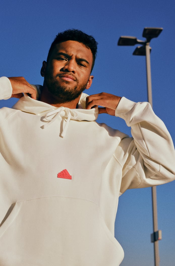 Young man wearing sports hoodie.