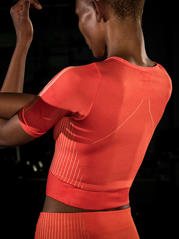 Female model working out in adidas training collection
