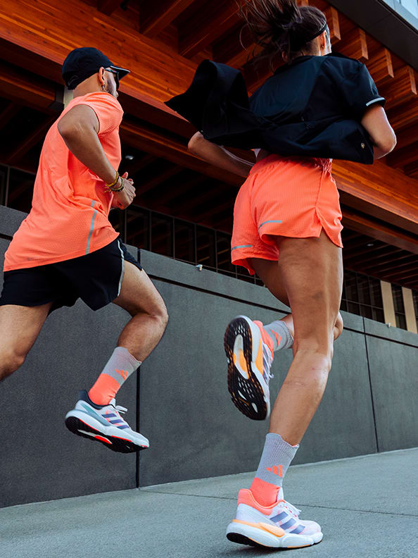 Image of two runners running together