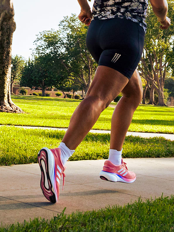 Image of a women runner in the park.