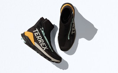 A pair of black and yellow shoes