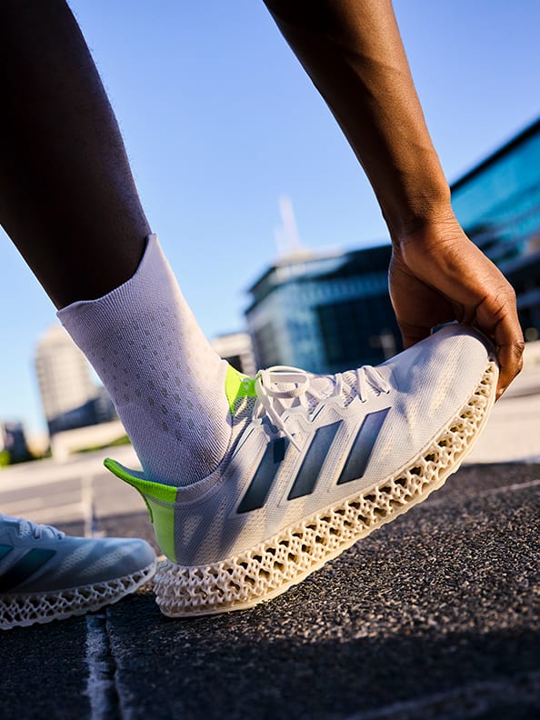 Series of close-ups of the adidas 4DFWD3 wore by two models