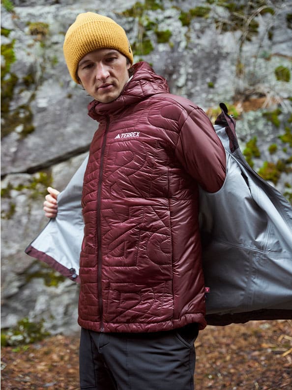 A person wearing a hat and jacket