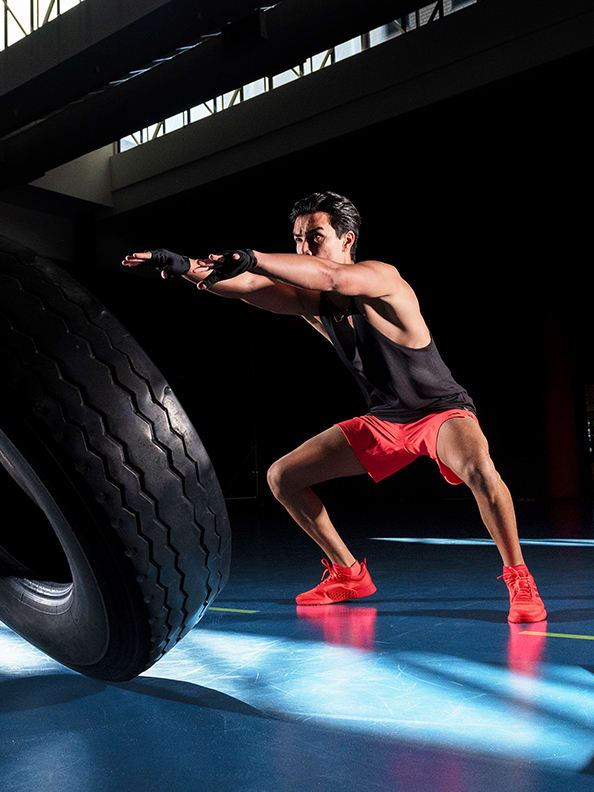 Male model working out in adidas training collection