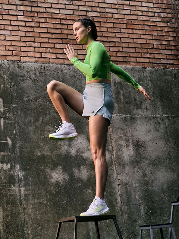 Female model working out in adidas training collection
