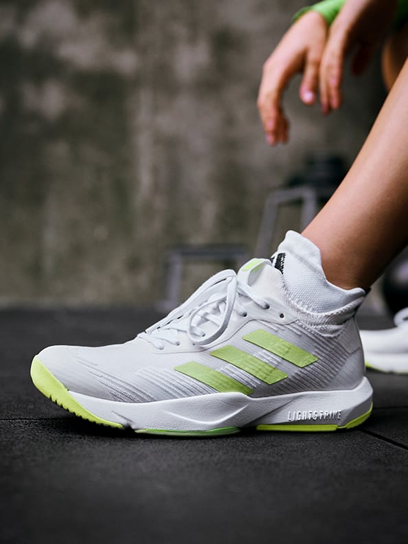 Female model working out in adidas training collection