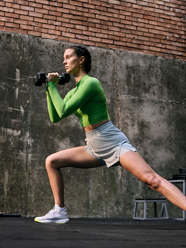 Female model working out in adidas training collection