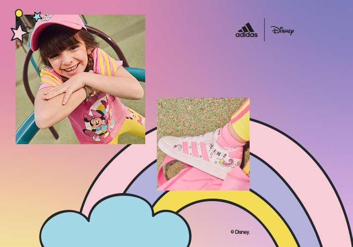 A young girl playing on a playground in the new adidas & Disney Minnie & Daisy collection.