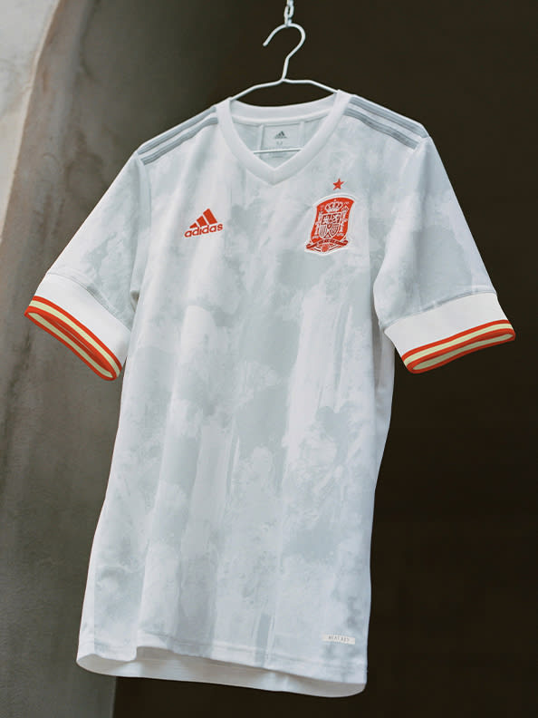 The new Spain Away jersey is shown here. With splashes of colour, the design reflects the creativity that marks the current Spanish side.