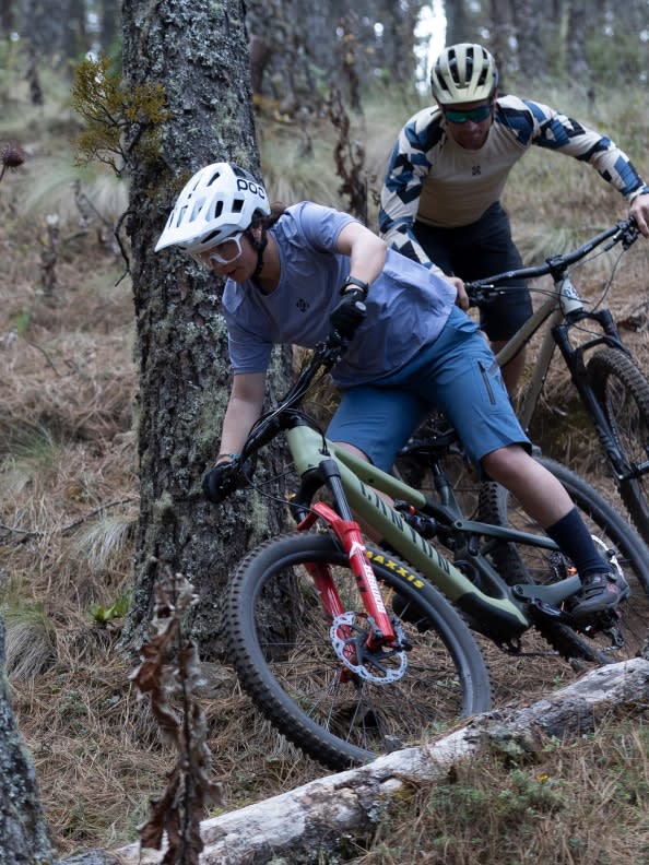 Samantha Soriano and Darren Berrecloth in action cycling.