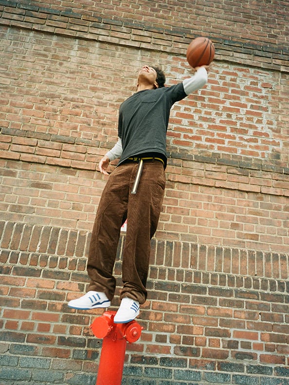 Models wearing both the Forum Low and Forum Mid in a variety of styles.