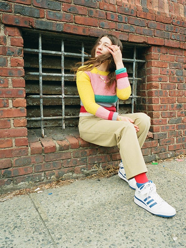 Models wearing both the Forum Low and Forum Mid in a variety of styles.
