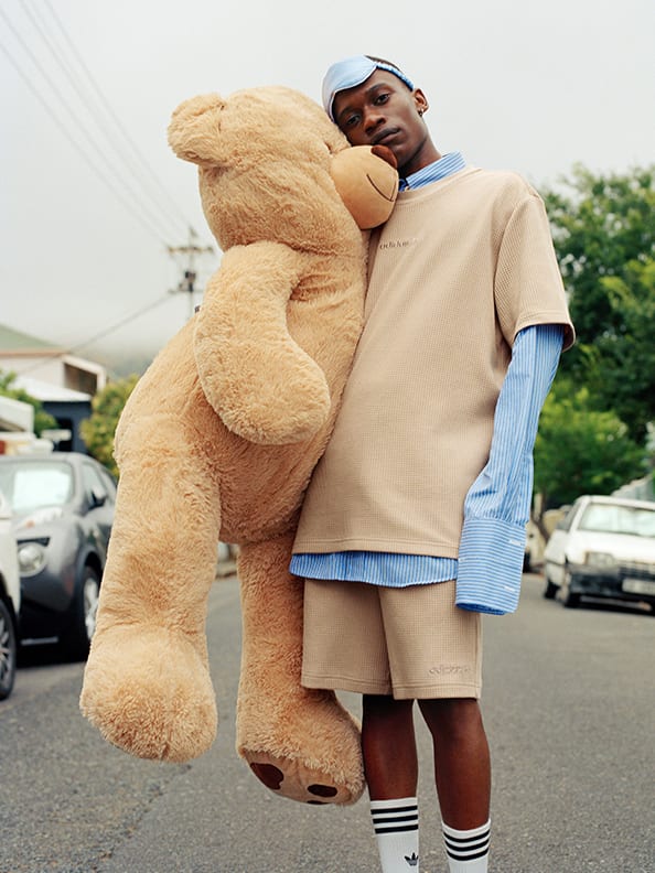 a man holding a teddy bear