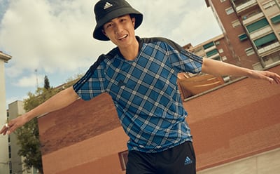 Image of the new TIRO collection in bright tartan prints.