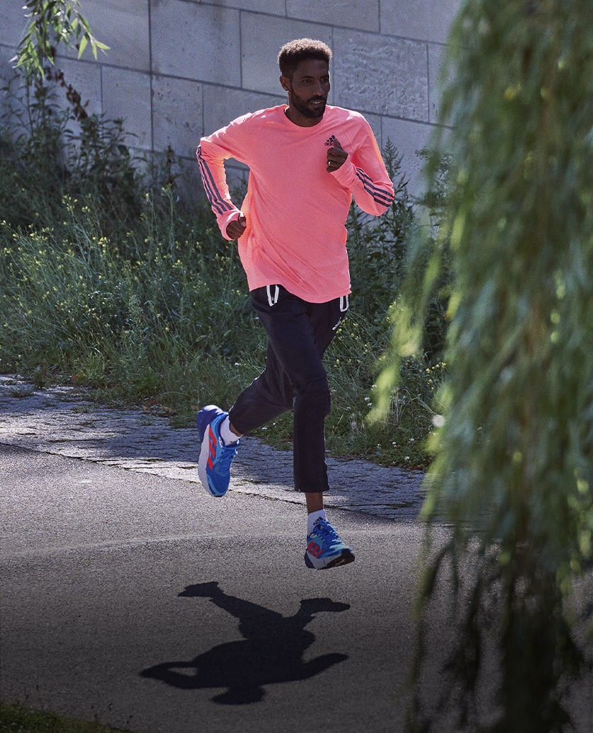 "Man running with the adidas Adistar running shoe "