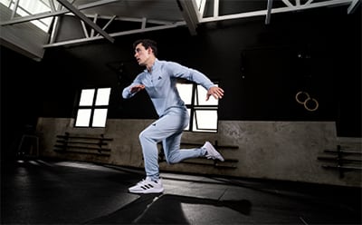Male model working out in adidas training collection
