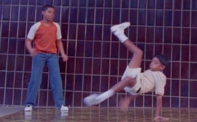 Kids are seen playing whilst wearing adidas Originals.